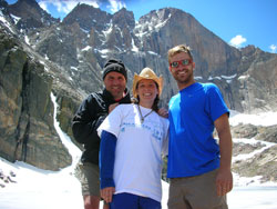 Summer Field Study staff members Chris Belch, Marcy Schoettle and Lucas Schroeder at the base of hte 2,500-foot sheer granite face of Long's Peak known as The Diamond. (Submitted photo) 
