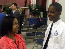 Brittnee Vaughn, left, and Terry Majors talk about their first days as members of the first class of Providence Cristo Rey High School in Indianapolis.	