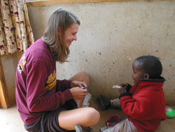 During a trip to Africa, Brebeuf Jesuit Preparatory School student Jessi Stevens of Indianapolis learned about the devastating effects of the AIDS pandemic on that continent. She also learned the difference that can be made through human connections. (Submitted photo) 