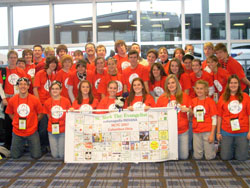 The group from St. Mark the Evangelist Parish in Indianapolis takes a break for a photograph during NCYC 2007.
