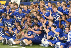 Bishop Chatard High School football players celebrate with their hardware after beating St. Joseph High School in South Bend to win the IHSAA Class 3A state championship on Nov. 24. (Submitted photo) 