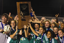 Members of the Cathedral High School girls’ soccer team whoop it up after beating Penn High School from Mishawaka, Ind., on Oct. 27 to win their first-ever state championship in girls’ soccer. (Submitted photo) 