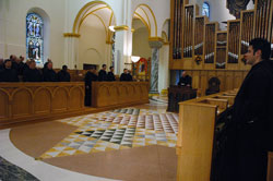 Monks of Saint Meinrad Archabbey in St. Meinrad pray Evening Prayer, also known as vespers, in the monastery’s church on Oct. 3. Their recently published book, The Tradition of Catholic Prayer, is a collection of 15 essays written by members of the community that trace the history of Catholic prayer.