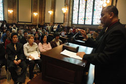 Deacon candidate Emilio Ferrer-Soto, who works for the Social Security Administration, gives a presentation about Social Security to a group of people who will soon become U.S. citizens during a naturalization ceremony held on Dec. 6 at the U.S. Federal Courthouse in Indianapolis. Ferrer-Soto has found opportunities in his work to direct Hispanic Catholics in the Indianapolis area to St. Patrick Parish—where he is a member—and the services it can offer them. (Photo by Sean Gallagher) 