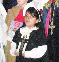 St. Joan of Arc School second-grader Mercedes Bickel portrays St. Theodora Guérin for the All Saints Day Mass on Nov. 1 at the Indianapolis North Deanery grade school. Students study the life of the foundress of the Sisters of Providence of Saint Mary-of-the-Woods. (Submitted photo) 