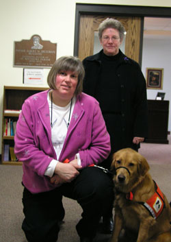 Mary Morois, left, Benedictine Sister Heidi Marie Krack and a golden retriever named Roxy are all part of a touching story about the powerful combination of dogs, children and faith. (Photo by John Shaughnessy)	