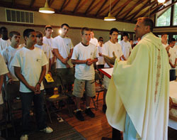 Father Rick Nagel, archdiocesan associate vocations director, delivers a homily during a Mass celebrated on June 14, 2007, at Bradford Woods in Morgan County during Bishop Bruté Days, sponsored by the Bishop Simon Bruté College Seminary. This year’s Bishop Bruté Days will take place on June 11-14 at the Future Farmers of America Center near Trafalgar. (File photo by Sean Gallagher)