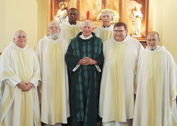 Father Frank Eckstein, fourth from left, poses with the concelebrating priests at his 50th jubilee Mass celebrated on July 13 at St. Nicholas Church in Ripley County. The concelebrating priests are, from left, Fathers Gerald Kirkhoff, Elmer Burwinkel, Pascal Nduka, Paul Landwerlen, Kevin Morris and Msgr. Harold Knueven. (Submitted photo) 