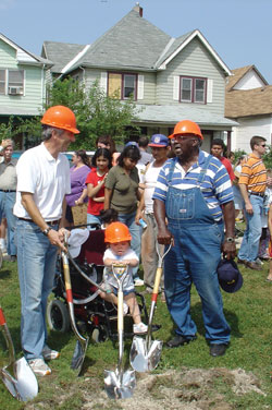 Lucious Newsom, right, and Anna Molloy break ground for Anna’s House in 2005. The clinic was named in honor of Anna, who helped feed the poor from her wheelchair during her life. She died on July 31. (Submitted photo) 