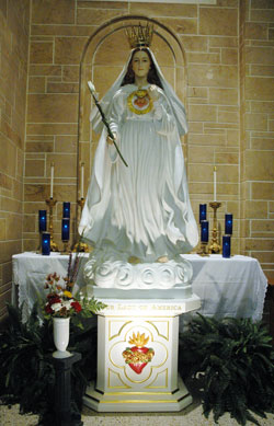 This statue of Our Lady of America was displayed for veneration at Our Lady of the Most Holy Rosary Church in Indianapolis on Nov. 3 and Nov. 4 in 2007 before it was restored by craftsmen at Weberding Carving Shop Inc. in Batesville. On May 24, it was placed on display at the Pope John Paul II Cultural Center in Washington, D.C. If approved by the U.S. bishops, the Marian statue will be permanently displayed at the Basilica of the National Shrine of the Immaculate Conception adjacent to The Catholic University of America in Washington. (Photo by Mary Ann Wyand) 