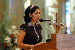 Veronica Arias, a member of St. Mary Parish in Indianapolis, serves as a lector during the Indianapolis East Deanery Mass honoring St. Theodora Guérin on May 23, 2006, at Holy Spirit Church in Indianapolis. (File photo by Mary Ann Wyand) 