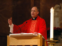 Father Jim Heyd, who serves as Cardinal Francis George’s liaison for pro-life ministries in the Archdiocese of Chicago, preaches the homily during a Jan. 20 Mass at SS. Peter and Paul Cathedral in Indianapolis before he joined archdiocesan priests, high school students and chaperones on the pro-life pilgrimage to the 36th annual March for Life from Jan. 20-23 in Washington, D.C. (Photo by Mary Ann Wyand) 