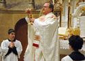 Father Magiera at Mass