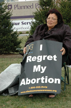 Dr. Alveda King of Atlanta, a pastoral associate of Priests for Life and spokeswoman for the national “Silent No More Awareness Campaign,” prays on March 10 in front of the Planned Parenthood abortion clinic in Indianapolis as part of the spring “40 Days for Life” pro-life prayer vigil. (Photo by Mary Ann Wyand) 