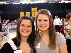 Kayla Wagoner, left, and Kaitlin Sims chose to make their confirmation a year early so it would coincide with the 175th anniversary celebration of the archdiocese on May 3. The two eighth-grade students at Our Lady of Lourdes School in Indianapolis pose for a picture before the anniversary Mass at Lucas Oil Stadium in Indianapolis. (Photo by John Shaughnessy) 
