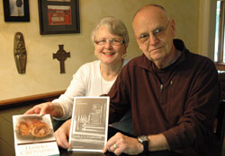St. Luke the Evangelist parishioners Sandra Marek Behringer and John Behringer of Indianapolis recently published a book of religious poetry titled Only a Passage. She also is the author of a novel, Hawks Crossing, published in 2005, about a family in a fictional southern Indiana town. (Photo by Mary Ann Wyand) 
