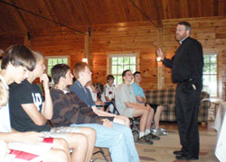 Archdiocesan vocations director Father Eric Johnson gives a presentation titled “I believe … in the life, death and resurrection of Jesus Christ” to campers on June 11. The camp and retreat experience for junior and senior high-school-aged boys who are thinking about the priesthood is sponsored by the Bishop Simon Bruté College Seminary in Indianapolis. (Photos by Mike Krokos) 