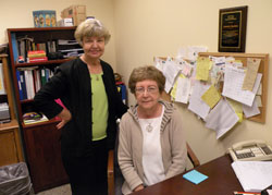 After nearly 15 years of service, Marge Hittle, left, and Patty Colbert retired as co-directors of the archdiocesan Crisis Office on June 25. The two women became friends while serving the poor and underemployed in Indianapolis. (Photo by Kamilla Benko) 