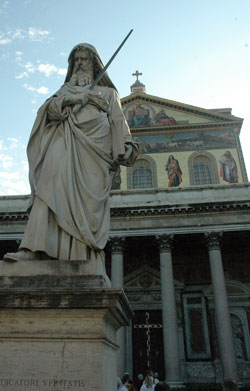 A statue of St. Paul stands outside the Basilica of St. Paul Outside-the-Walls in Rome, which is believed to have been built over his burial place. Father Stephen Banet, pastor of St. Jude Parish in Indianapolis, will be following in the footsteps of St. Paul, including a trip to Rome, during an upcoming sabbatical funded by a grant from Lilly Endowment Inc. (File photo by Sean Gallagher)