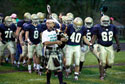 Football team with pink shoe laces