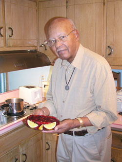 Alvin Bynum creates a special cranberry dish for family meals at Thanksgiving and Christmas. A member of St. Thomas Aquinas Parish in Indianapolis, Bynum learned the recipe from his late wife of 52 years, Marie. (Photo by John Shaughnessy)