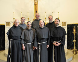 Members of the new definitory of the Conventual Franciscan Friars of the Province of Our Lady of Consolation include, front row, from left, Friars Camillus Gott, John Stowe, James Kent and Paul Clark, and, back row, Friars Mark Weaver, Wayne Hellmann and Martin Day. (Submitted photo)