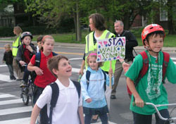 Students at St. Thomas Aquinas School in Indianapolis walk and ride their bikes to school on April 23, a day that celebrated the north side Catholic school’s involvement in the U.S. Department of Transportation’s “Safe Routes to School” program. (Photo by John Shaughnessy)