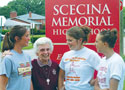 Teacher and students at Scecina High School