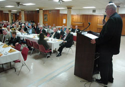 Msgr. Joseph F. Schaedel, vicar general, speaks to members of the board of trustees of the Catholic Community Foundation and other guests during the board’s annual meeting on Nov. 10 at Our Lady of the Most Holy Rosary Parish in Indianapolis. The Catholic Community Foundation manages 381 endowments that support parishes, schools, agencies and other ministries across the archdiocese. (Photo by Sean Gallagher)