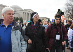 Walking together during the 37th annual March for Life on Jan. 22 in Washington, D.C., are, from left, St. Patrick parishioner Tom McBroom of Terre Haute; Servants of the Gospel of Life Sister Diane Carollo, director of the archdiocesan Office for Pro-Life Ministry; and Our Lady of the Most Holy Rosary parishioner Branden Stanley of Avon, who volunteered as a videographer for the Jan. 21-22 pro-life pilgrimage. (File photo by Alea Bowling)