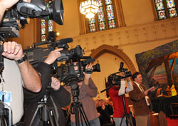 Videographers and reporters from Indianapolis television stations and newspapers participate in a Jan. 14 press conference at St. John the Evangelist Church in Indianapolis as Archbishop Daniel M. Buechlein introduces Bishop-designate Christopher J. Coyne. (Photo by Mary Ann Wyand)