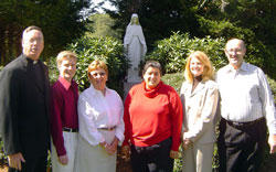In this 2007 photo, then-Father Christopher J. Coyne, the pastor of St. Margaret Mary Parish in Westwood, Mass., left, poses with the faith community’s pastoral staff. They include, from left, music director Patrick Valentino, secretary/parish coordinator Mary McSorely, pastoral associate Mary Peterson (no longer on the staff), director of religious education and youth ministry Karelene Duffy, and Deacon Joseph E. Holderried. (Submitted photo)