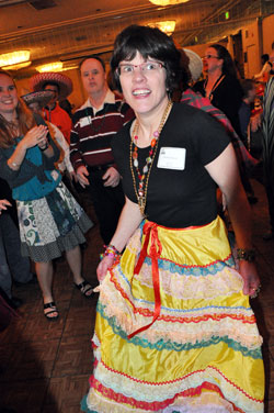 SPRED participant Heather Simon from Holy Spirit Parish in Indianapolis enjoys dancing to rock and roll music on March 19 during the Special Religious Development dinner and dance in Indianapolis. (Photo by Mary Ann Wyand)