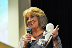 Ultrasound technician and pro-life speaker Shari Richard of West Bloomfield, Mich., displays a fetal model made by Our Lady of Mount Carmel parishioner Noel Merrick of Carmel, Ind., in the Lafayette Diocese, during her keynote speech for the Great Lakes Gabriel Project’s second annual “Partners for Life” fundraising dinner on March 29 in Indianapolis. The pro-life ministry’s website is www.glgabrielproject.org. (Photo by Mary Ann Wyand)