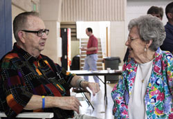 Jerry Craney talks with Helen Gasper during a June 5 retirement reception in which he was honored for his 52 years as the music minister at Most Holy Name of Jesus Parish in Beech Grove. (Photo by Alea Bolwing)