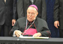 Archbishop Buechlein at press conference