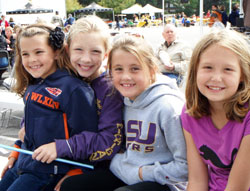 Members of the third-grade class at St. Luke the Evangelist School in Indianapolis are all smiles during the parish’s Jubilee Jam Festival on Sept. 24 on the grounds of the Indianapolis North Deanery parish. The third-grade students are, from left, Elena Telesco, Caroline Kiefer, Julianne Vaughan and Claire Bromund. A special Mass to mark St. Luke’s 50th anniversary was celebrated that evening. (Submitted photo)