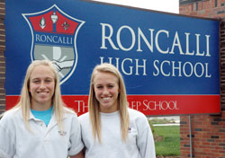 Twin sisters Kaitie, left, and Cassie Schultheis share just about everything in life—from earning 12 varsity letters at Roncalli High School in Indianapolis to planning on studying pharmacy in college. (Photo by John Shaughnessy)