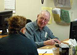 Jim Fillenwarth volunteers every Tuesday morning at the St. Vincent de Paul Society food pantry in Indianapolis, helping people in need register for the food assistance program. (Submitted photo)