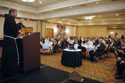 Franciscan Father Peter Vasko, president of the Franciscan Foundation for the Holy Land, speaks during a fundraising dinner for the foundation on March 12, 2011, in Indianapolis. (File photo by Sean Gallagher)