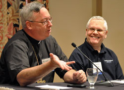 Bishop Christopher J. Coyne, apostolic administrator of the archdiocese, speaks during a panel discussion on blogging on June 22 at the Catholic Media Conference in Indianapolis. Also on the panel was Deacon Greg Kandra, executive editor of One, the magazine of the Catholic Near East Welfare Association, who also maintains his own blog, “The Deacon’s Bench.” (Photo by Sean Gallagher)