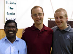 Seminarians Xavier Raj, from left, Michael Keucher and Kyle Rodden pose for a photo at St. John the Baptist Parish in Starlight on Aug. 15 during the annual archdiocesan seminarian pilgrimage. All three seminarians receive their priestly formation at Saint Meinrad Seminary and School of Theology in St. Meinrad. Raj is a member of St. Jude Parish in Indianapolis. Keucher is a member of St. Charles Borromeo Parish in Bloomington. Rodden is a member of Most Sacred Heart of Jesus Parish in Jeffersonville. (Submitted photo)