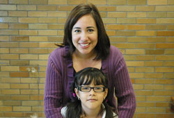 Esmeralda Gomez and her daughter, Aylee, are all smiles because of the girl’s experiences at St. Philip Neri School in Indianapolis. Aylee has been able to attend the school through the generosity of people who contribute to the Educational CHOICE Charitable Trust. (Photo by John Shaughnessy)