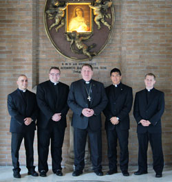 Archbishop Joseph W. Tobin, center, poses on Oct. 31 at the Pontifical North American College in Rome with archdiocesan seminarians who receive their priestly formation there. They are, from left, seminarian Matthew Tucci, a member of Holy Family Parish in New Albany; transitional Deacon Douglas Marcotte, a member of St. Michael Parish in Greenfield; transitional Deacon Martin Rodriguez, a member of St. Mary Parish in Indianapolis; and seminarian Anthony Hollowell, a member of Nativity of Our Lord Jesus Christ Parish in Indianapolis. (Submitted photo)