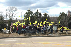 40 Days for Life participants rally in front of the Planned Parenthood facility at 86th St. and Georgetown Road in Indianapolis on March 3 to mark the spring campaign’s midpoint. (Submitted photo)