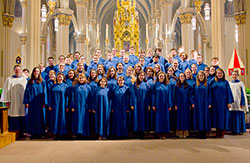 The University of Notre Dame Liturgical Choir poses in the Basilica of the Sacred Heart on the university’s northern Indiana campus. The choir will perform a concert at 6:30 p.m. on May 12 at SS. Peter and Paul Cathedral, 1347 N. Meridian St., in Indianapolis. (Photo courtesy of the University of Notre Dame)