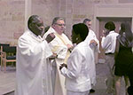 Woman receiving her first Communion