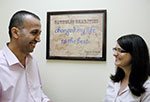 Basim Najeeb and a Catholic Charities employee