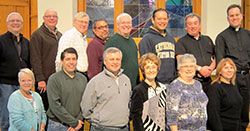 The Central Indiana Cursillo Community secretariat for the Archdiocese of Indianapolis and the Diocese of Lafayette pose for a picture at St. Monica Parish in Indianapolis on Feb. 2. Front row: Sandy Neidigh, left, Carlos Alatorre, Tom Kitchin, Beth Doran, Kathy Schallert and Molly Sanders. Back row: John Ameis, left, Tim Hays, Mark Scheller, Mark Totleben, Marty Van der Burgt, Tony Avellana, Father Glenn O’Connor, who serves as Cursillo spiritual director in the Archdiocese of Indianapolis, and Father Mike McKinney, Cursillo spiritual director in the Diocese of Lafayette. (Submitted photo)
