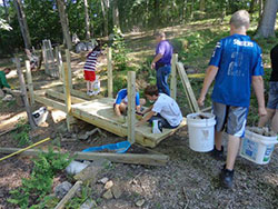 Volunteers work in Brown County during Indiana Nazareth Farm, an annual service camp sponsored by St. Agnes Parish in Nashville, and St. Benedict and Sacred Heart of Jesus parishes in Terre Haute. (Submitted photo)